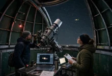 Observatory telescope under a starry sky tracking the planet Saturn